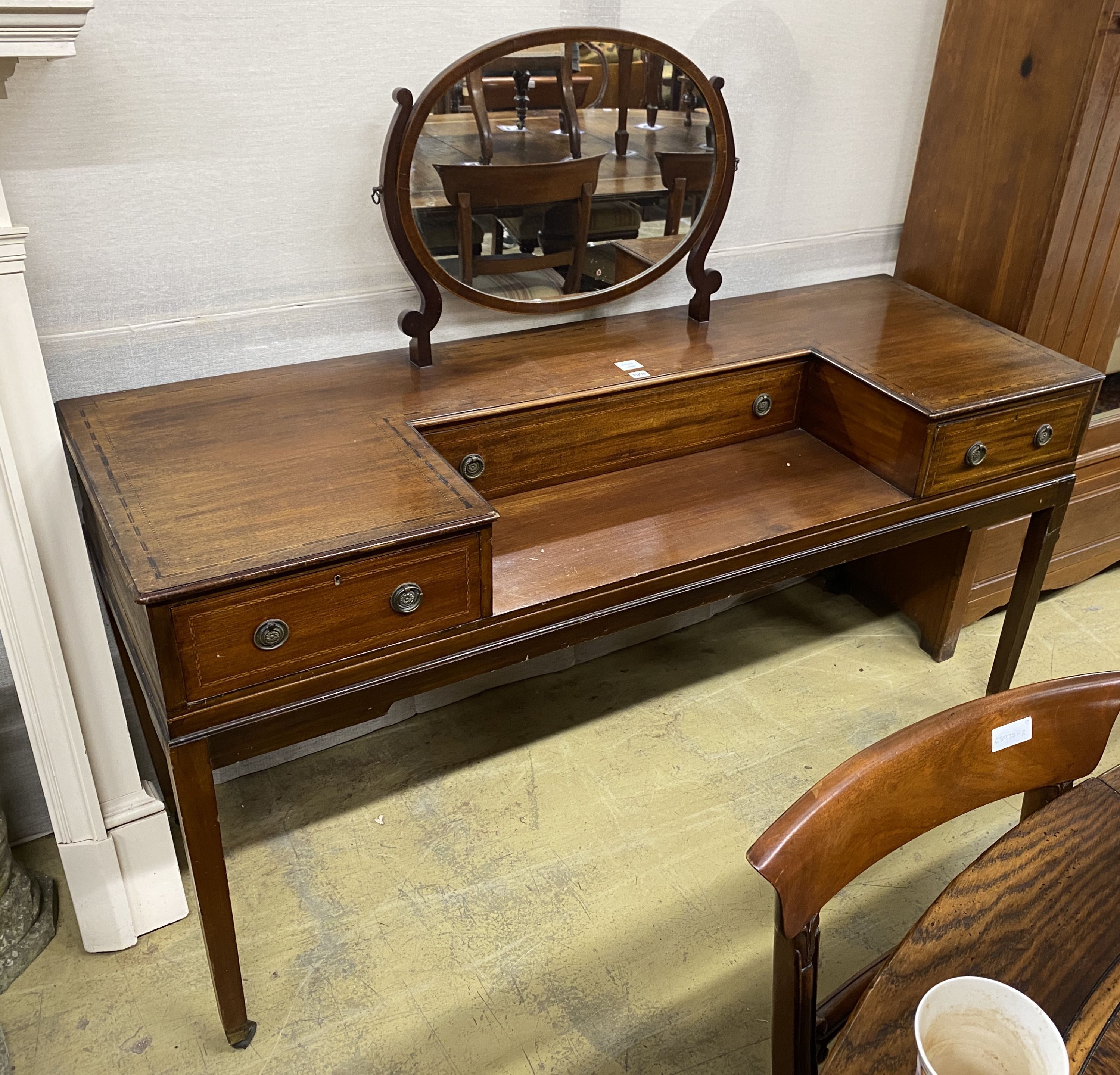 A mid 19th century mahogany dressing table,